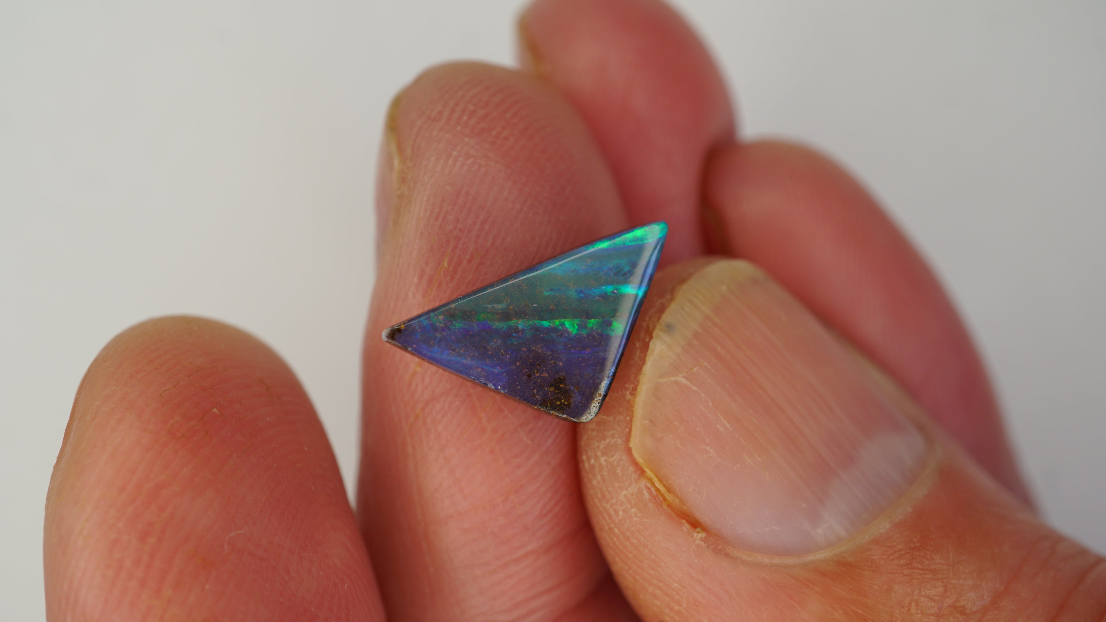 Lightning Stride Boulder Opal - Dark Blue with Striking Green Stripes