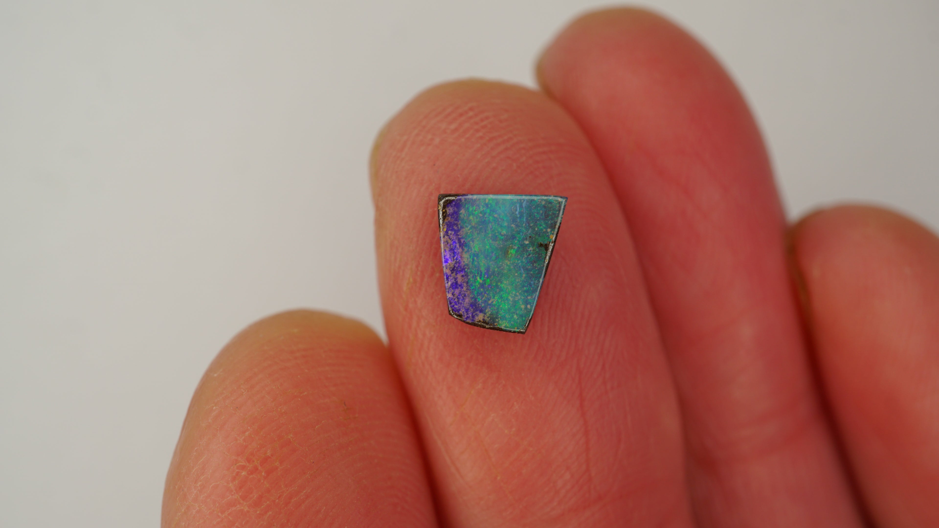 1.4ct Boulder Opal - Green Pinfire on Purple Base