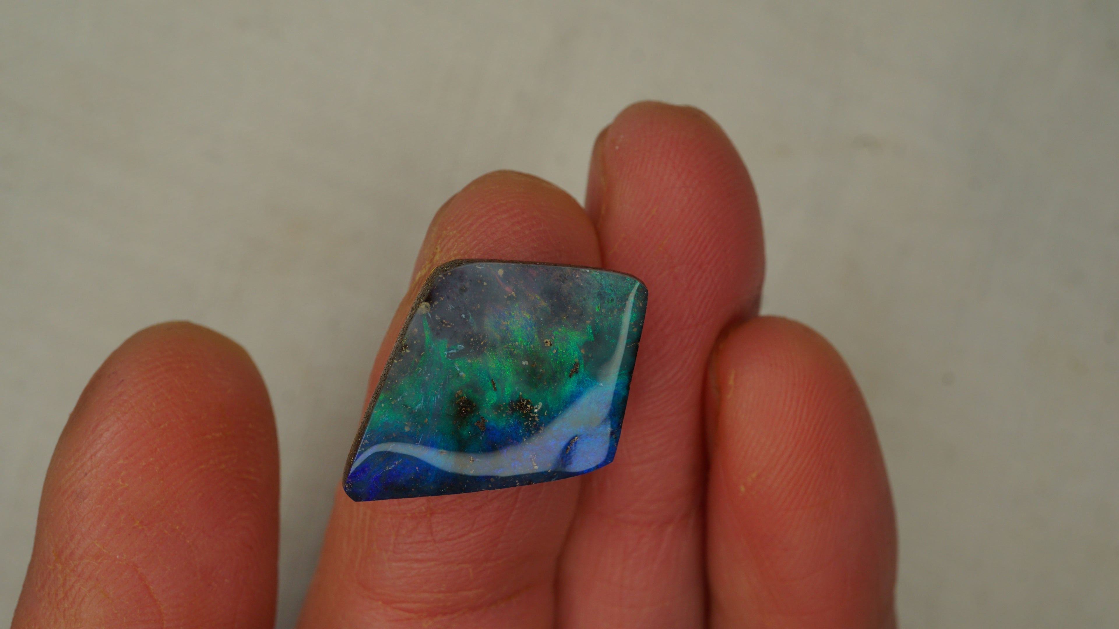 12.9 ct Kite-Shaped Boulder Opal - Blue Base with Green & Aqua Flash