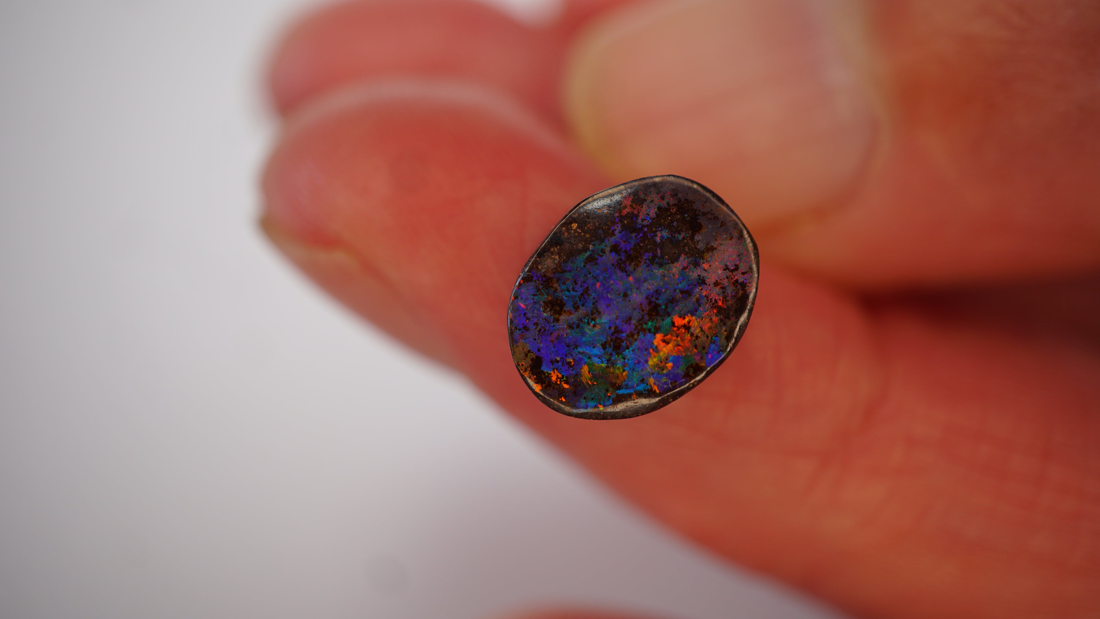 4.3ct Boulder Opal - Green & Blue Play Through Ironstone Matrix with Directional Neon Blue, Orange & Red