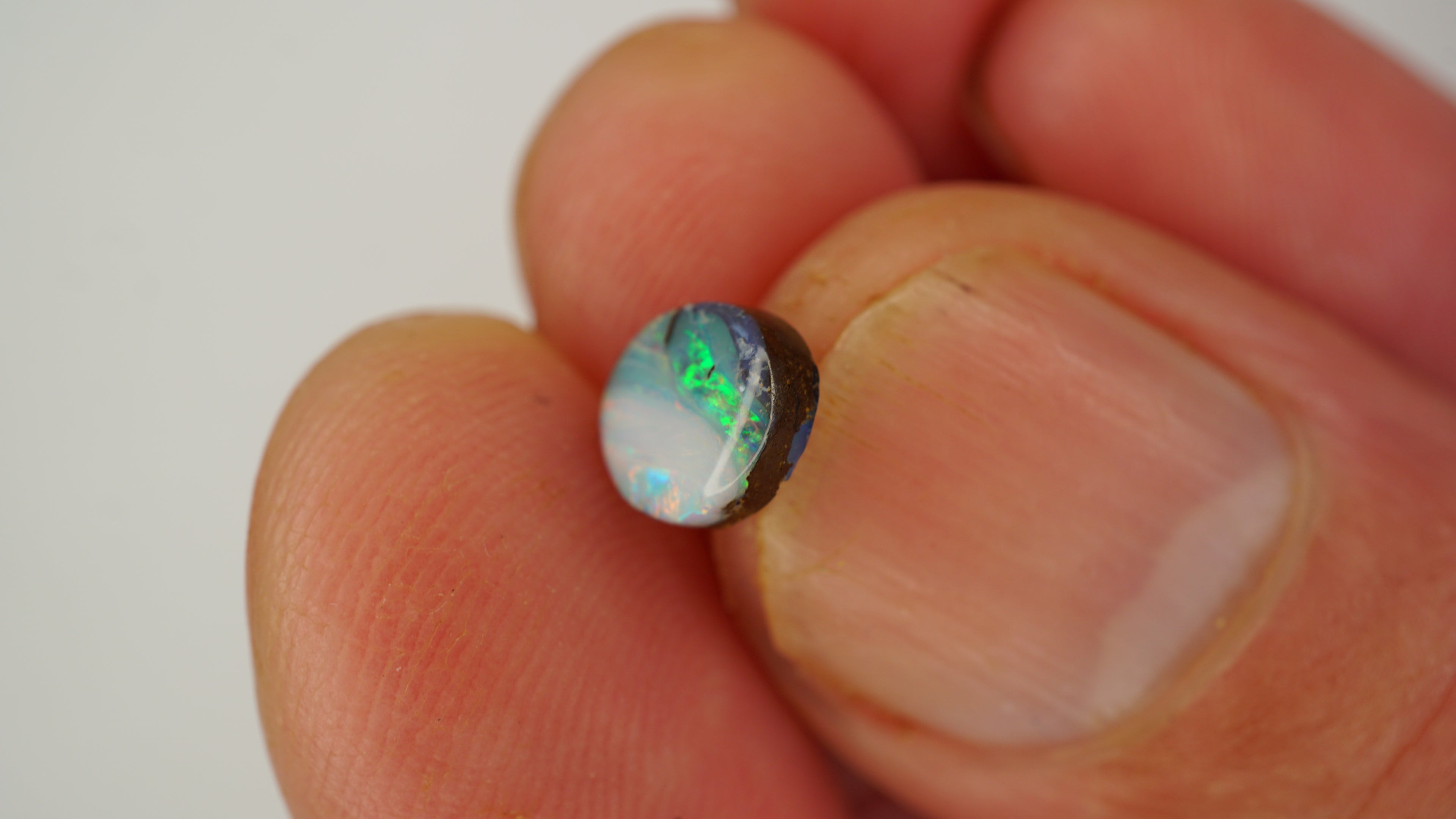 1.6ct Boulder Opal - Green & White Host Body Tone with Aqua, Pink & Gold Directional Play