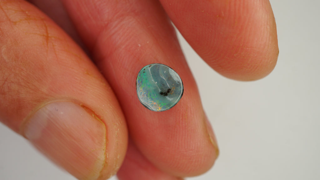 1.4ct Boulder Opal - Green & Orange Pinfire on White Base