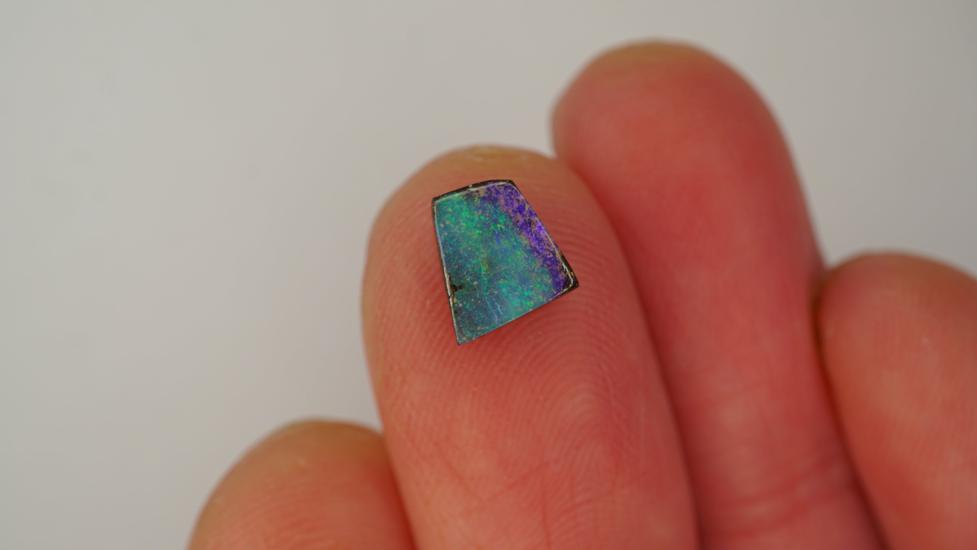 1.4ct Boulder Opal - Green Pinfire on Purple Base