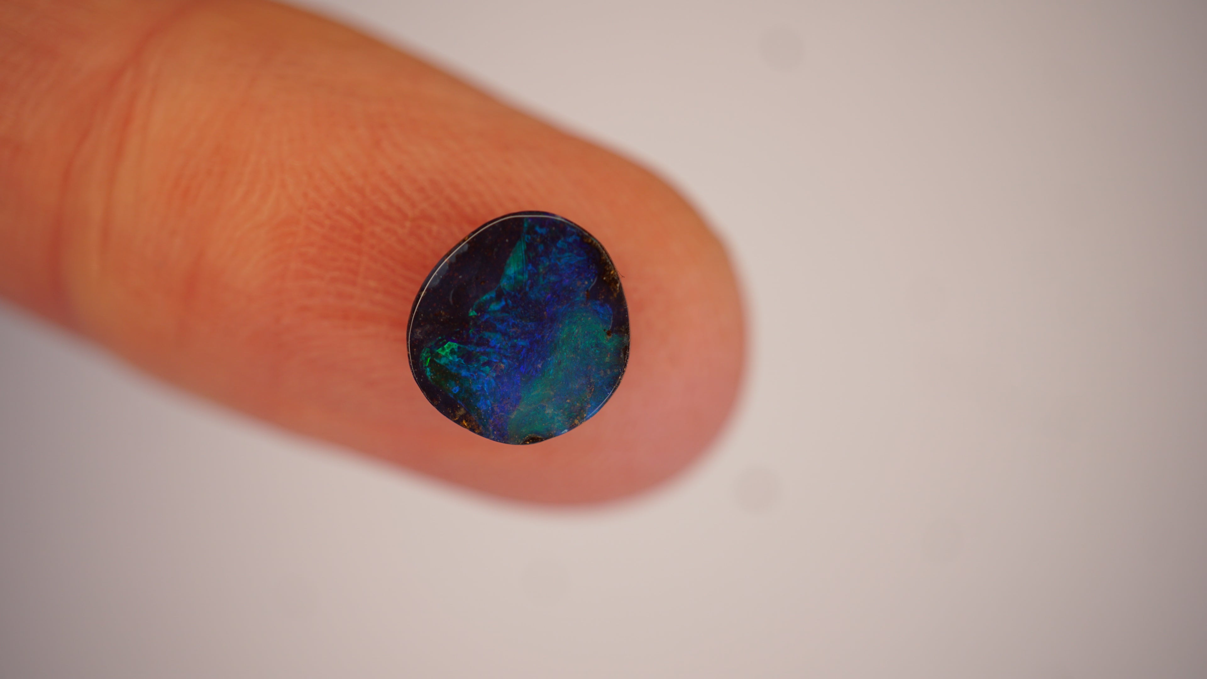 2.2ct Boulder Opal - Green Play on Deep Blue Host Body Tone