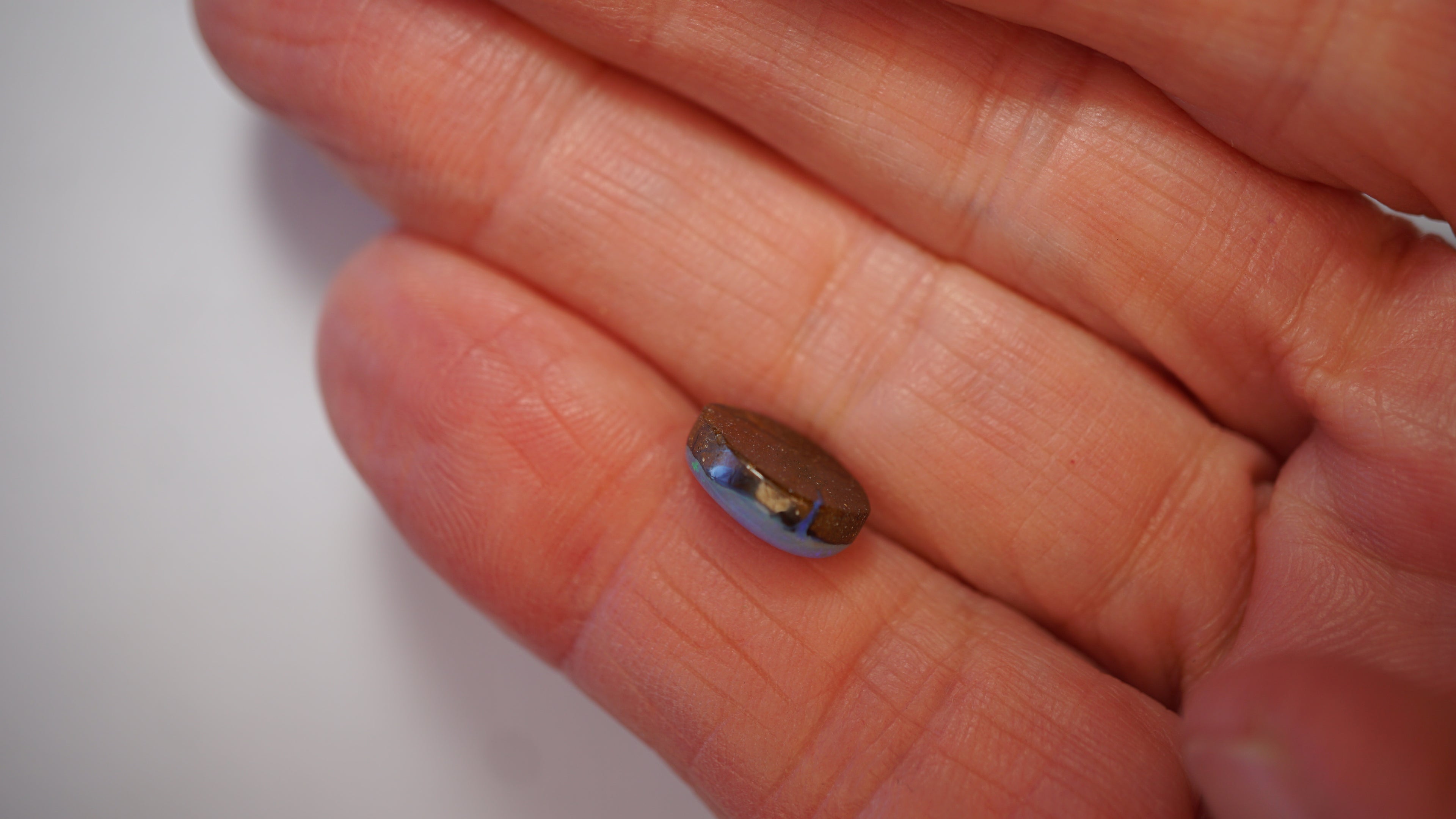 3.5ct Boulder Opal - Green & Electric Blue Fire on Blue Host Body Tone