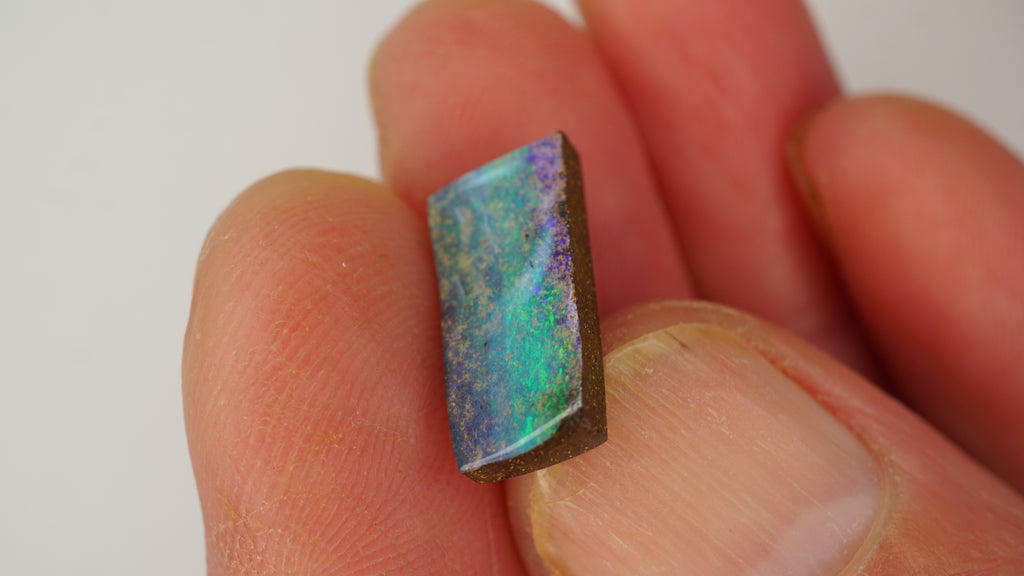 5.8 ct Rectangular Purple Boulder Opal - Green Pinfire Banding