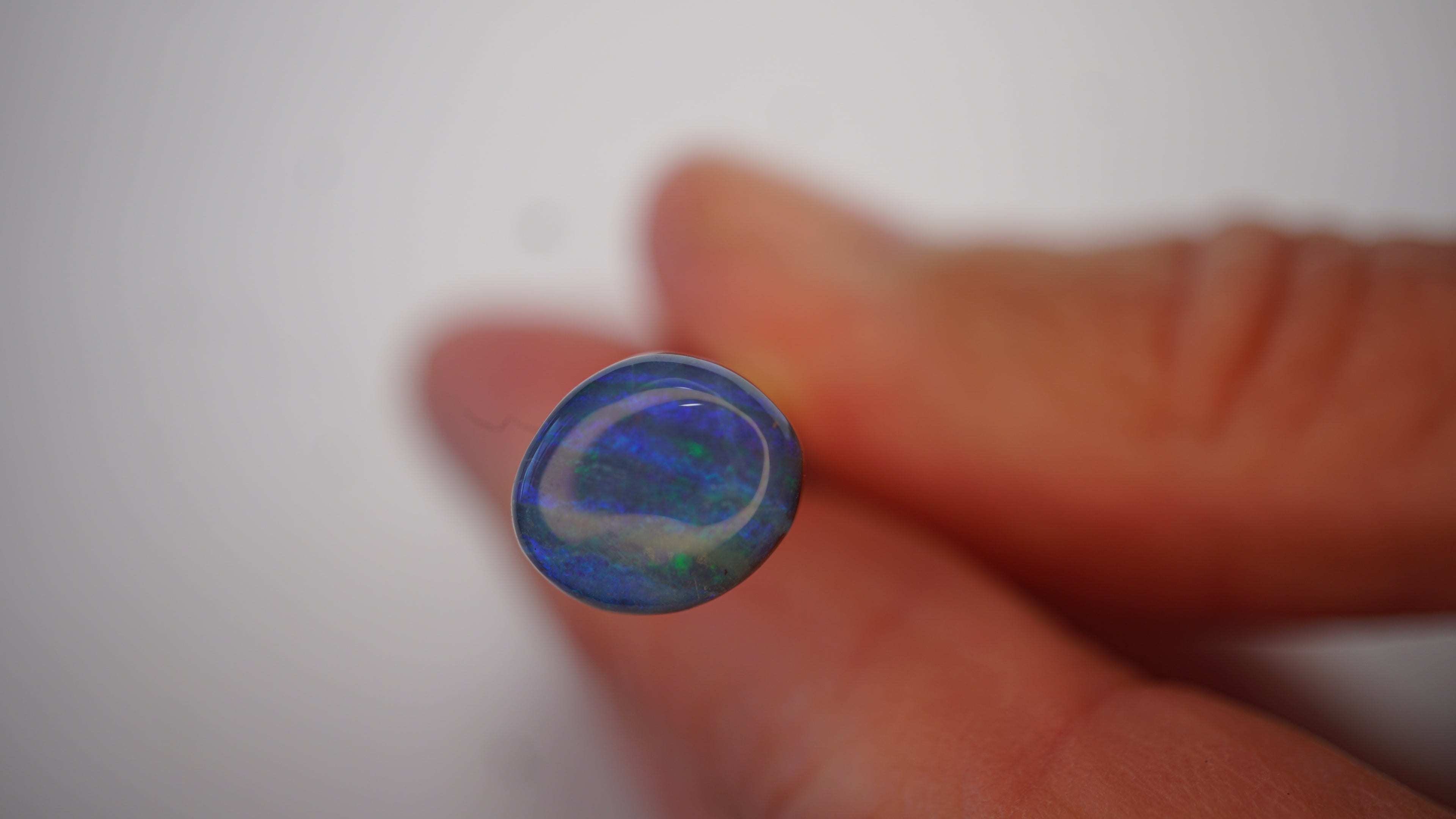 3.5ct Boulder Opal - Green & Electric Blue Fire on Blue Host Body Tone