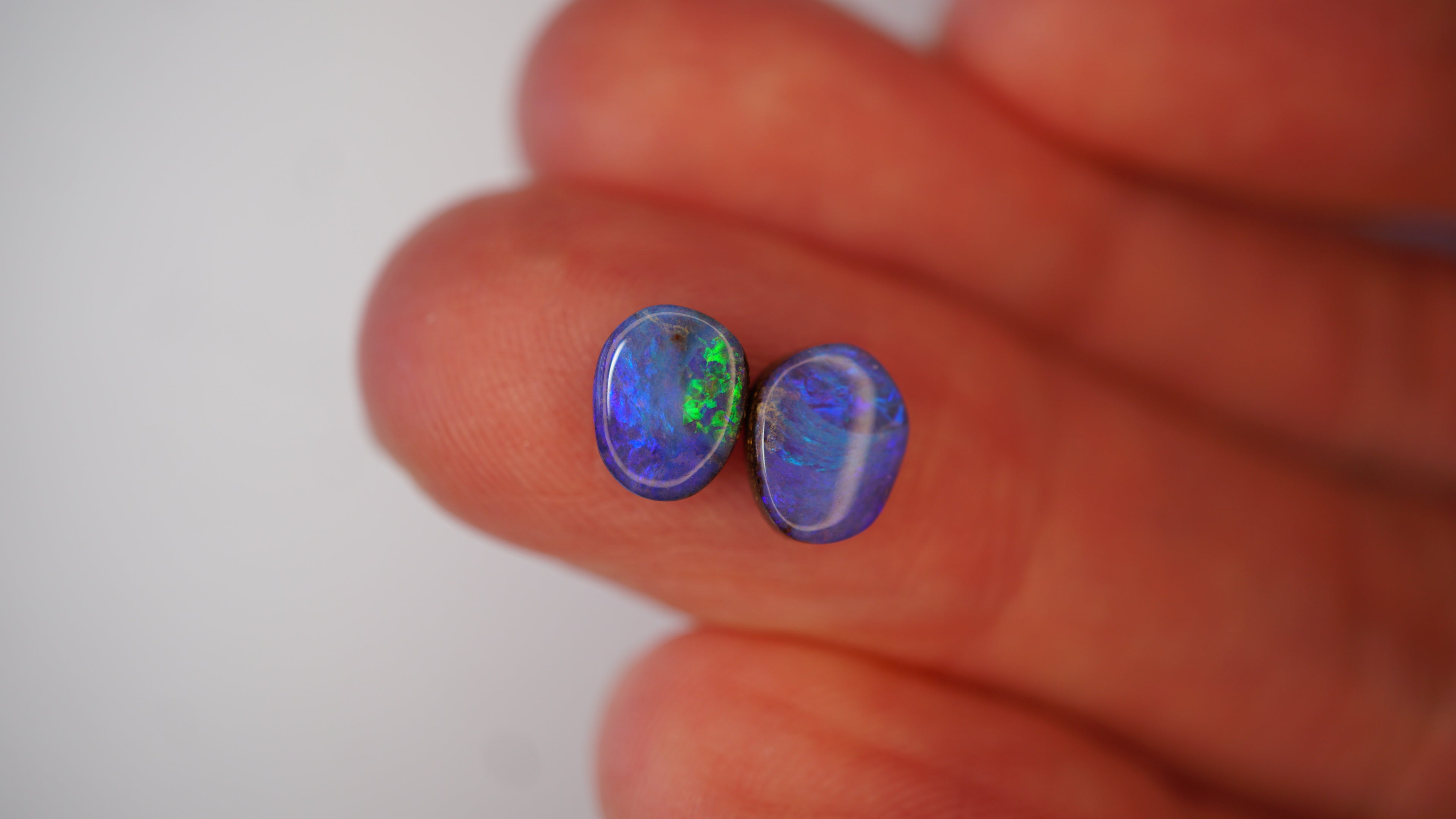 2.5ct Matched Boulder Opal Pair - Neon Green Play on Royal Blue Host Body Tone