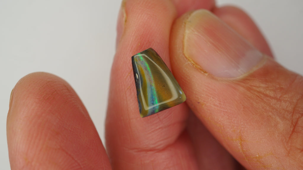 Forest Arc Boulder Opal - Brown with Arching Bright Green Play