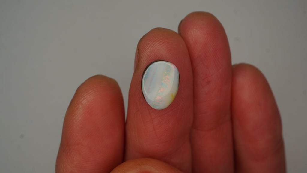 Prism Streak Boulder Opal - White with Red, Green, Yellow & Blue Play