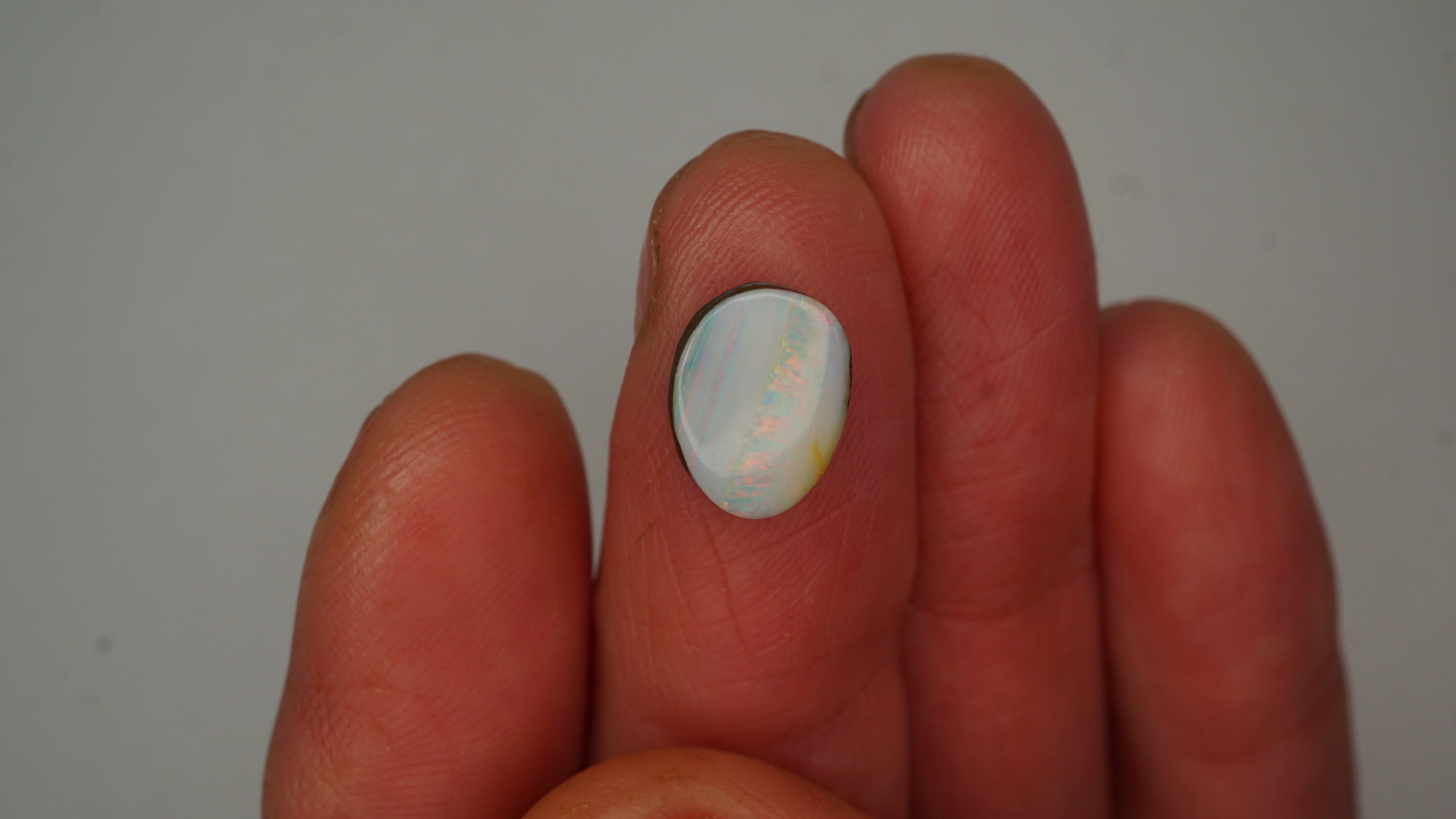 Prism Streak Boulder Opal - White with Red, Green, Yellow & Blue Play