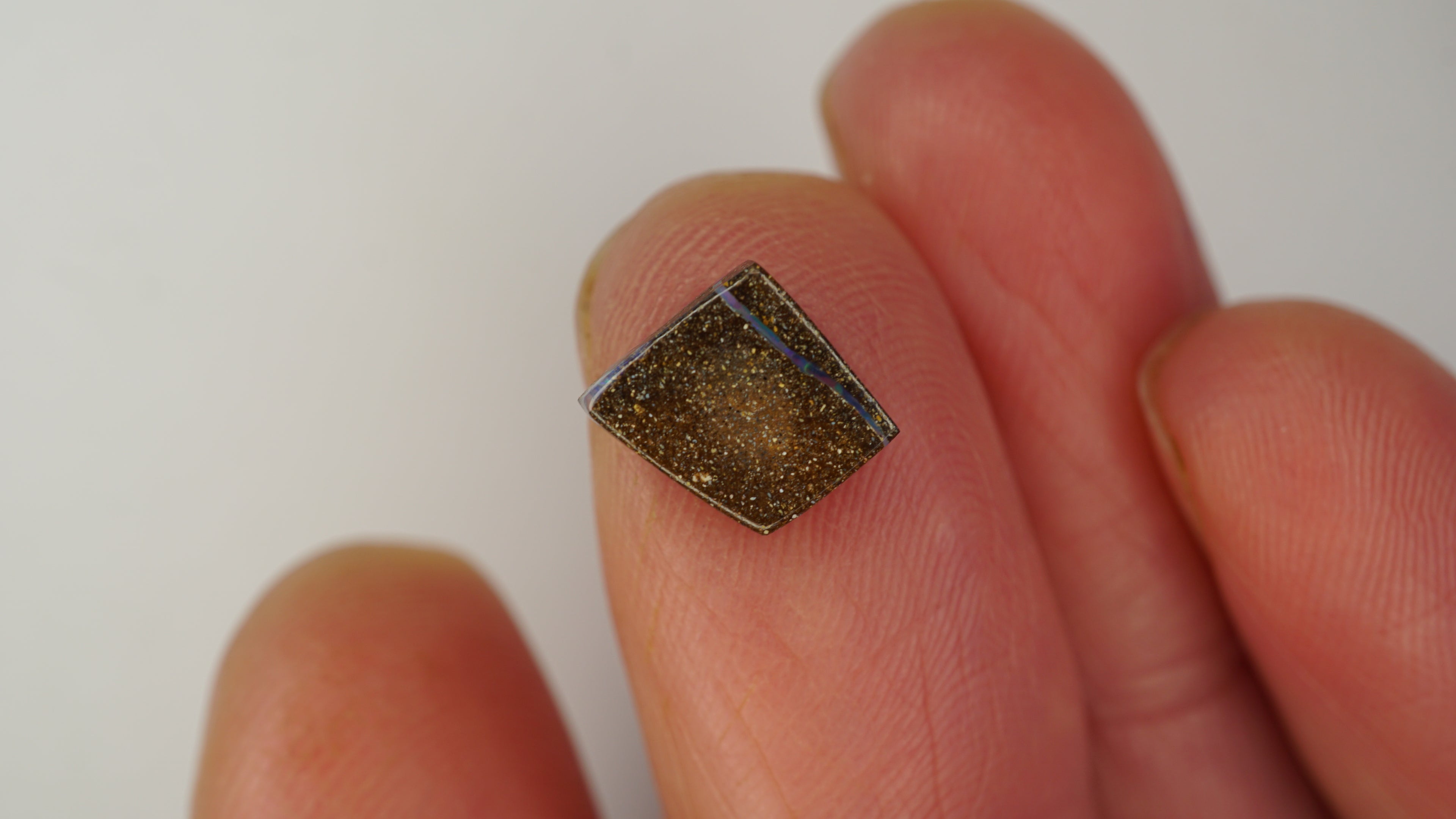 2.1ct Boulder Opal - Green & Purple Bars on Blue Host Body Tone
