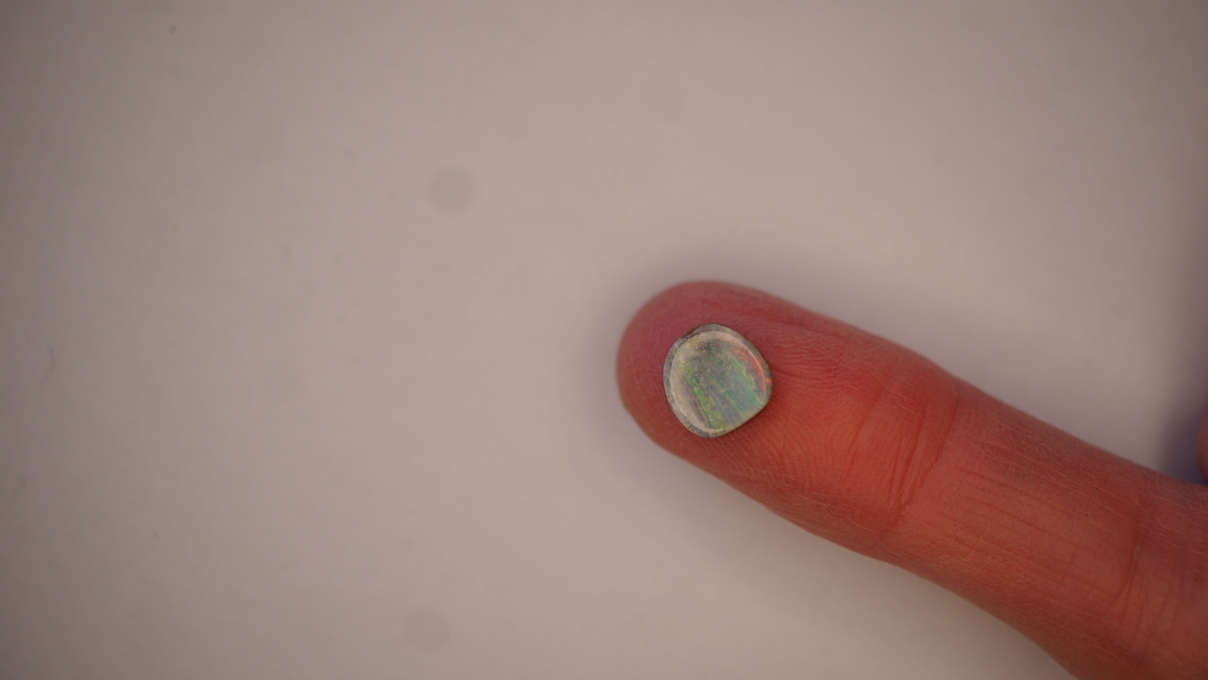 2.8 ct Pale Blue Boulder Opal - Green & Crimson Streaked Colour Play