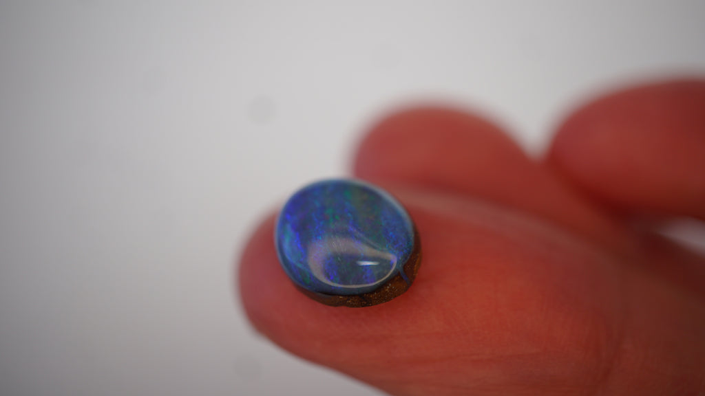 3.5ct Boulder Opal - Green & Electric Blue Fire on Blue Host Body Tone