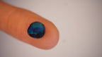 2.2ct Boulder Opal - Green Play on Deep Blue Host Body Tone