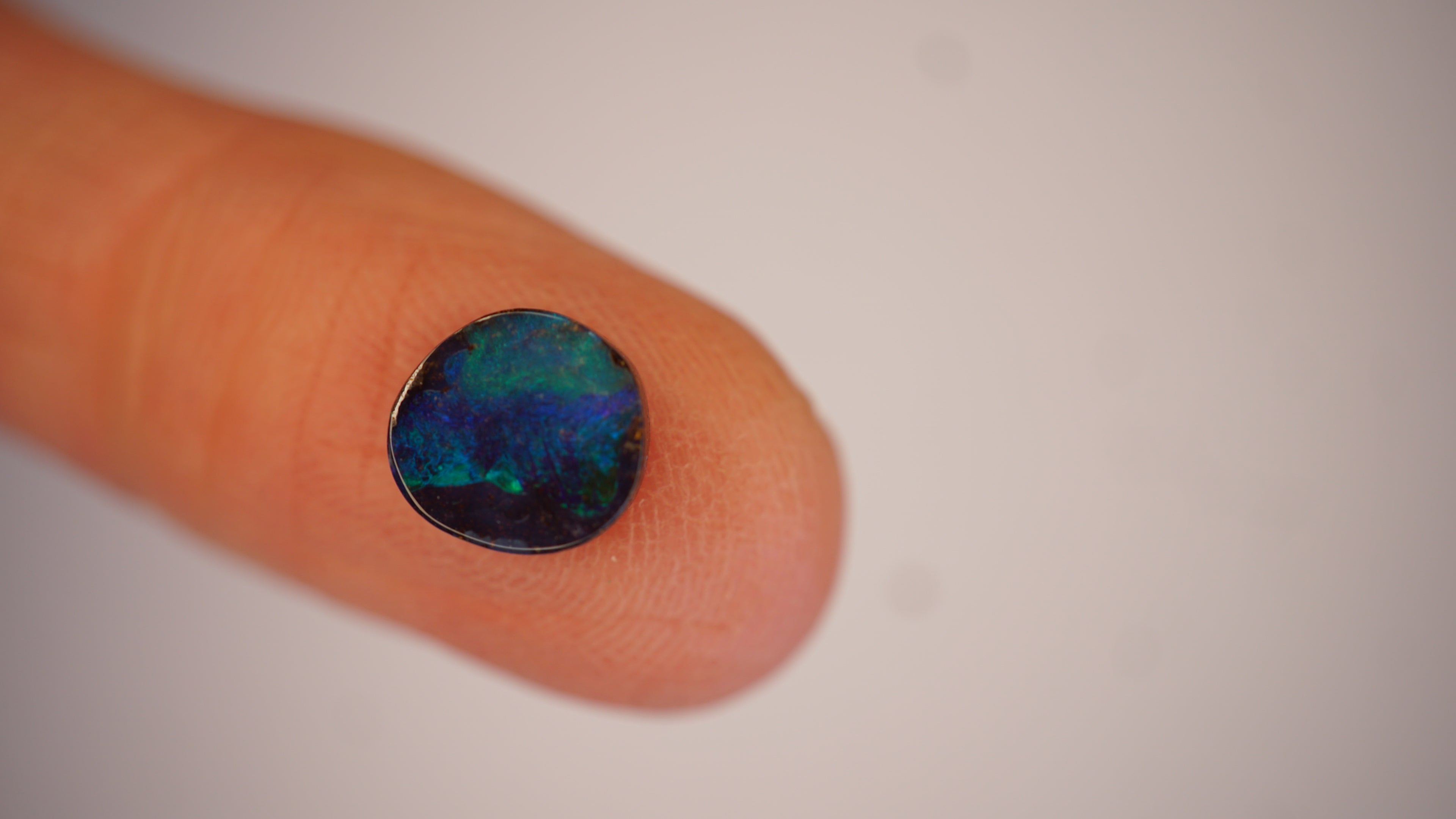 2.2ct Boulder Opal - Green Play on Deep Blue Host Body Tone