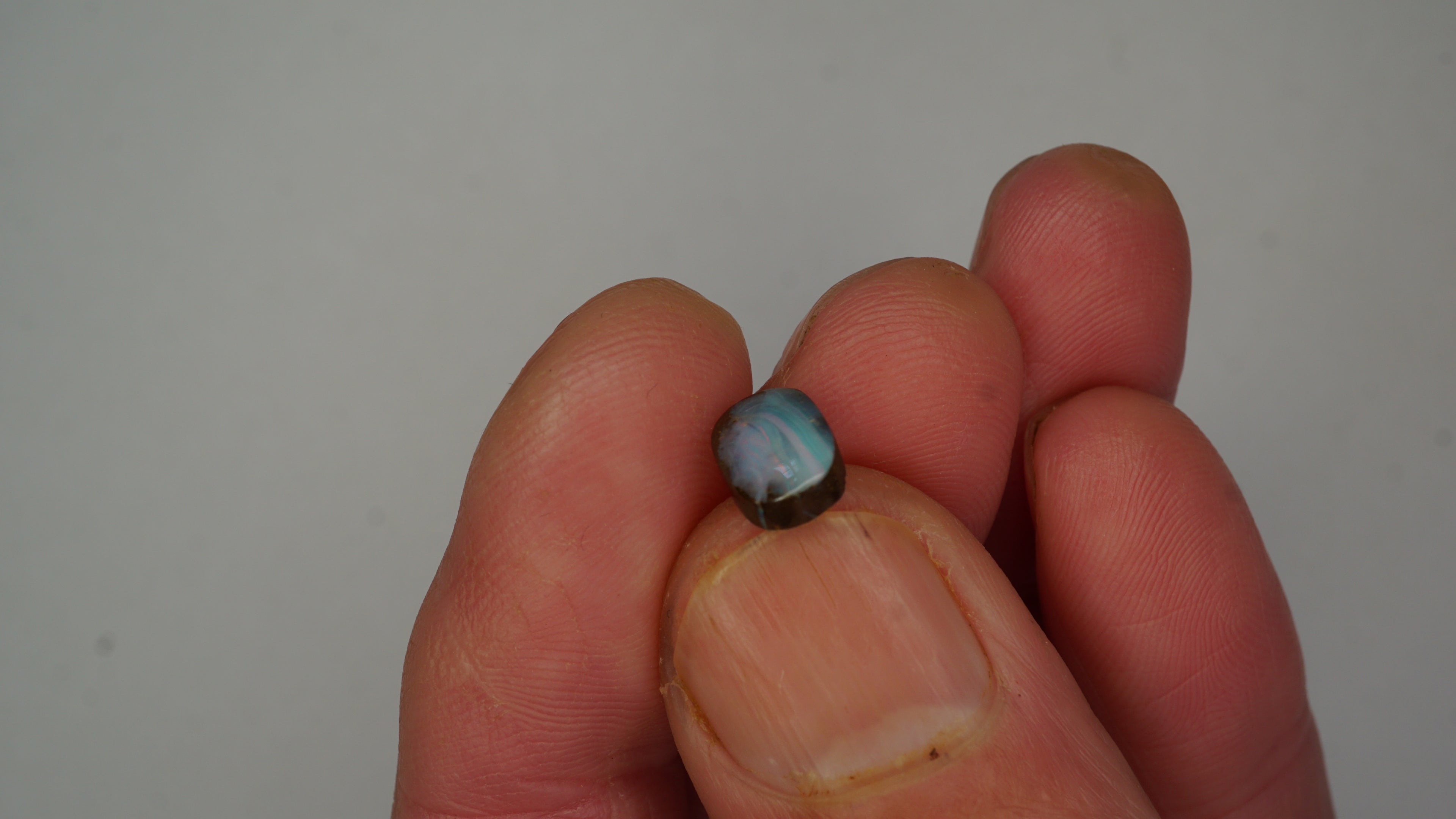 1.9ct Boulder Opal - Pink, Green & Red Pinfire on Blue-Green Host Body Tone