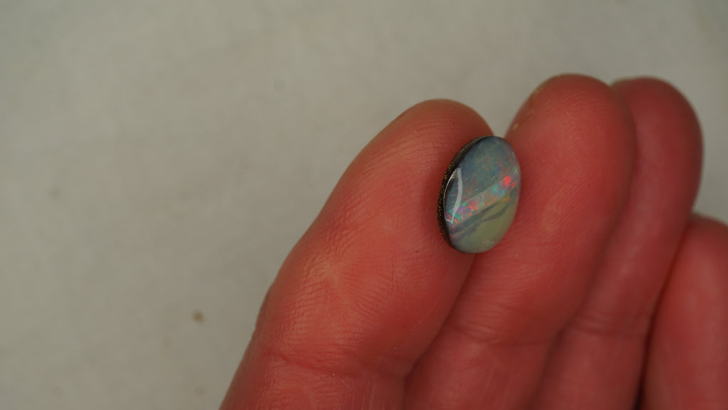 4.0ct Boulder Opal - Cat-Eye Effect with Green & Gold Play on Dark Host Body Tone