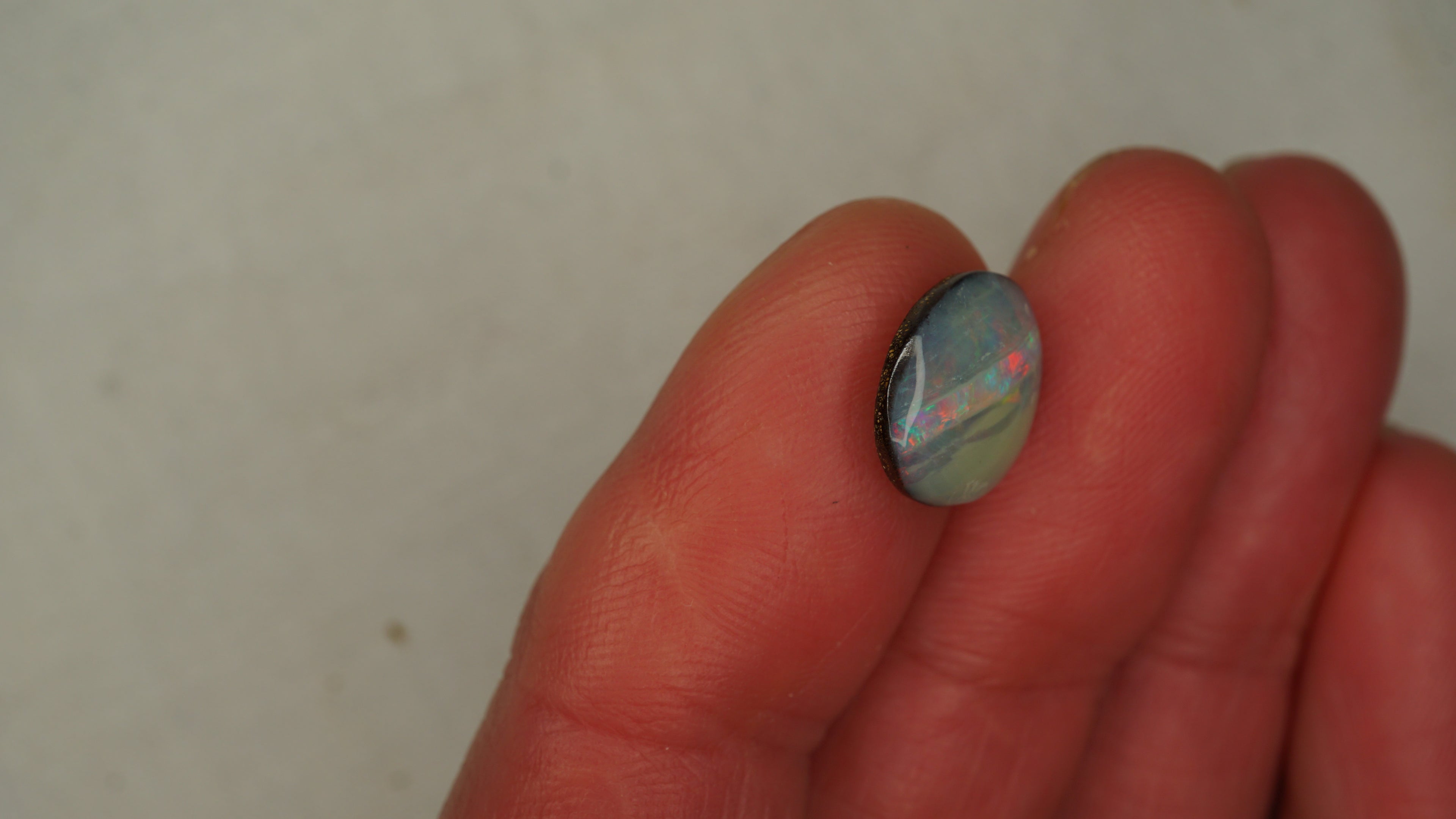 4.0ct Boulder Opal - Cat-Eye Effect with Green & Gold Play on Dark Host Body Tone