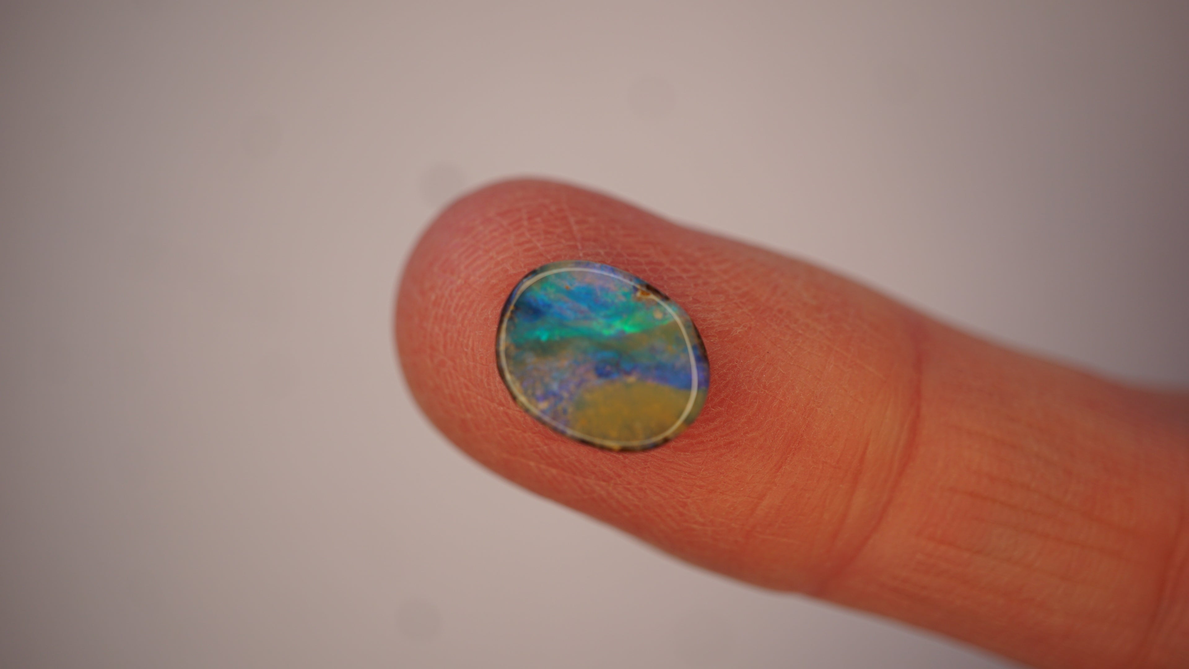 2.5ct Boulder Opal - Electric Green Sash on Blue Base