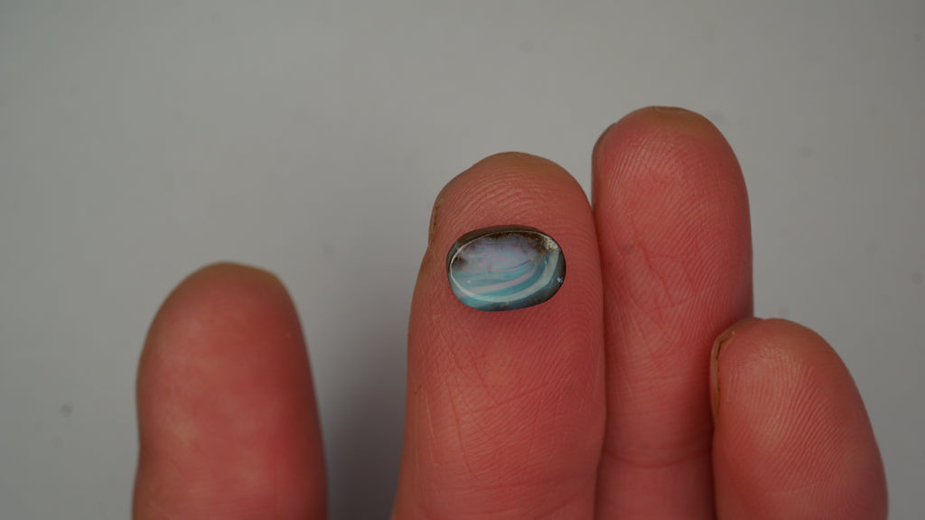 1.9ct Boulder Opal - Pink, Green & Red Pinfire on Blue-Green Host Body Tone