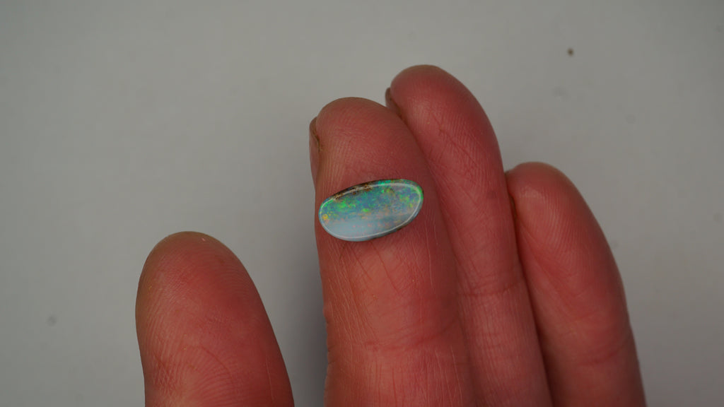 Aurora Veil Boulder Opal - Pale Purple with Green, Blue & Crimson Band
