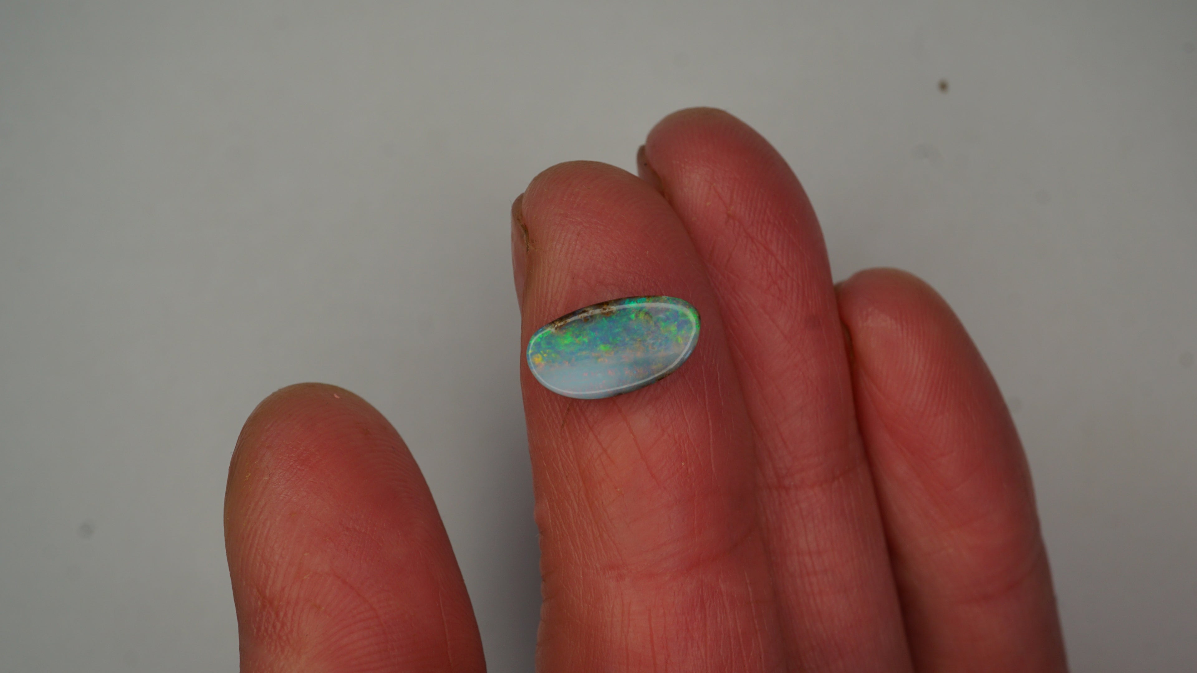 Aurora Veil Boulder Opal - Pale Purple with Green, Blue & Crimson Band