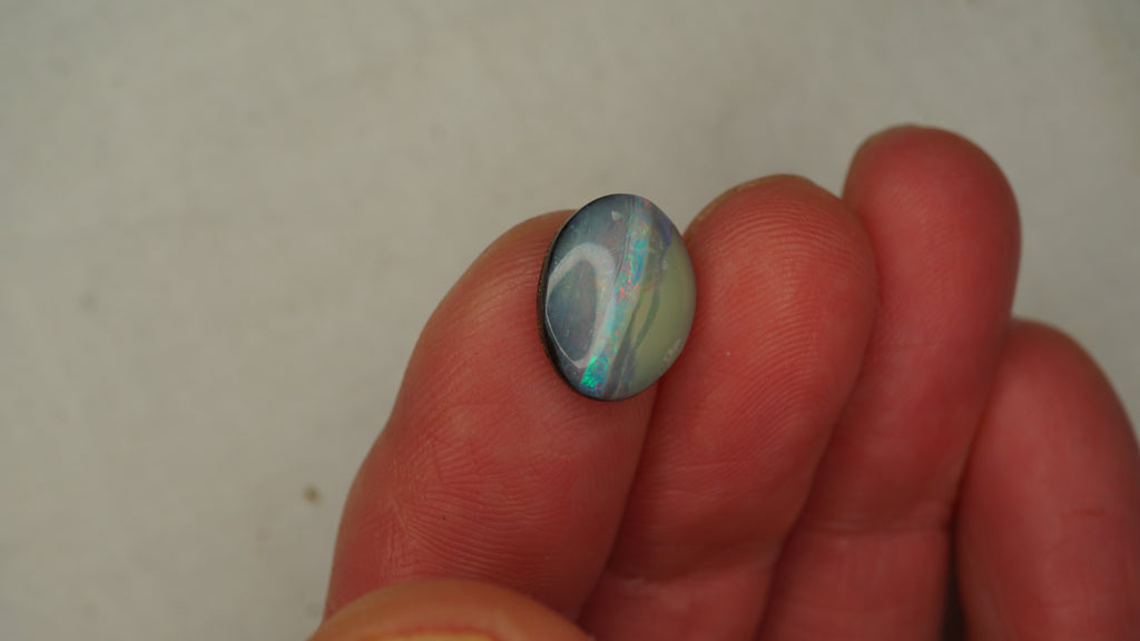 4.0ct Boulder Opal - Cat-Eye Effect with Green & Gold Play on Dark Host Body Tone