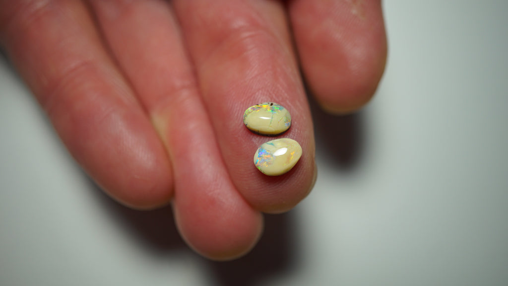 2.3ct Matched Boulder Opal Pair - Green & Aqua Play with Blue and Yellow Highlights on Brown Host Body Tone