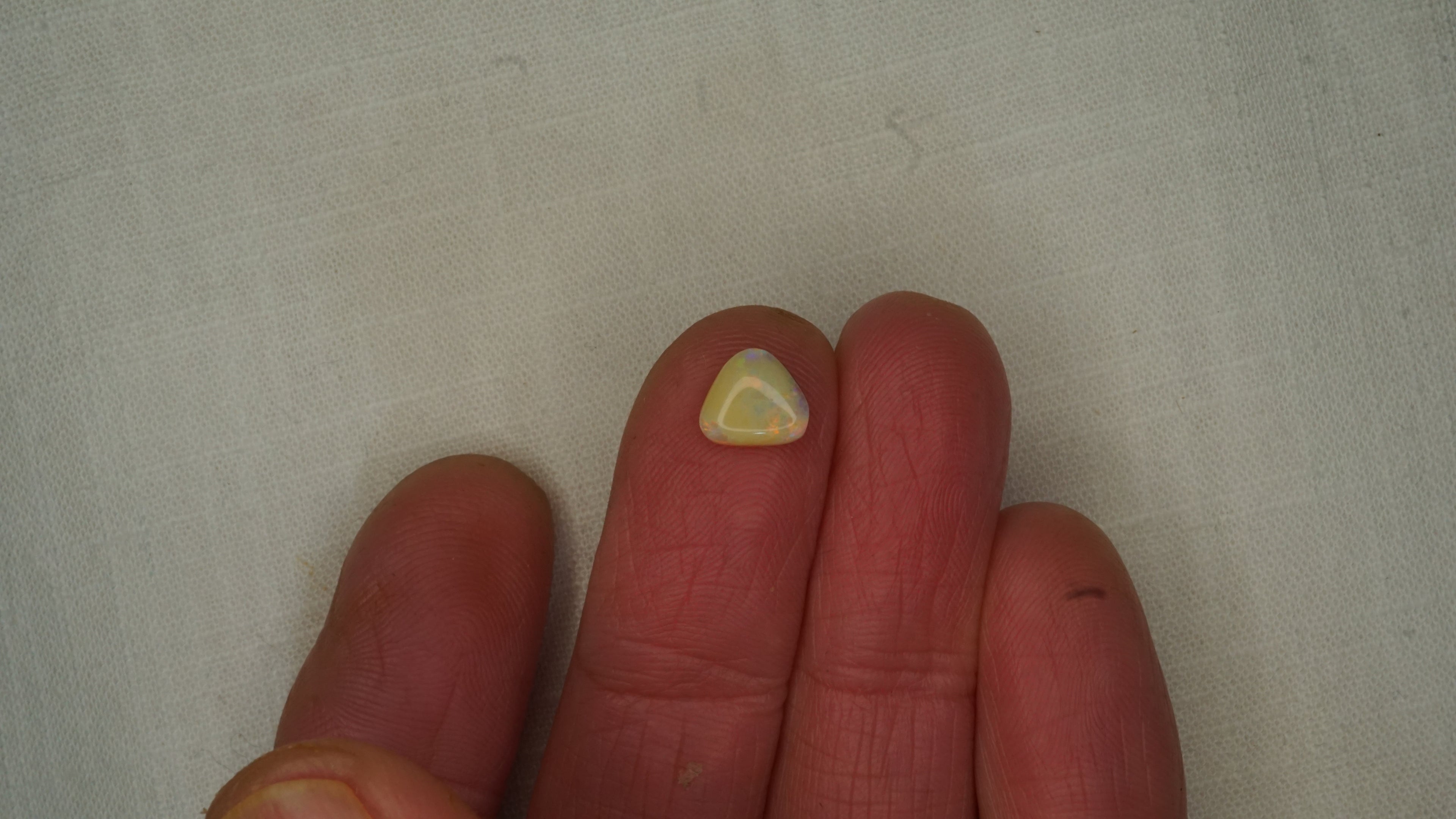 1.1 ct Ochre Opal - Red & Green Colour Play
