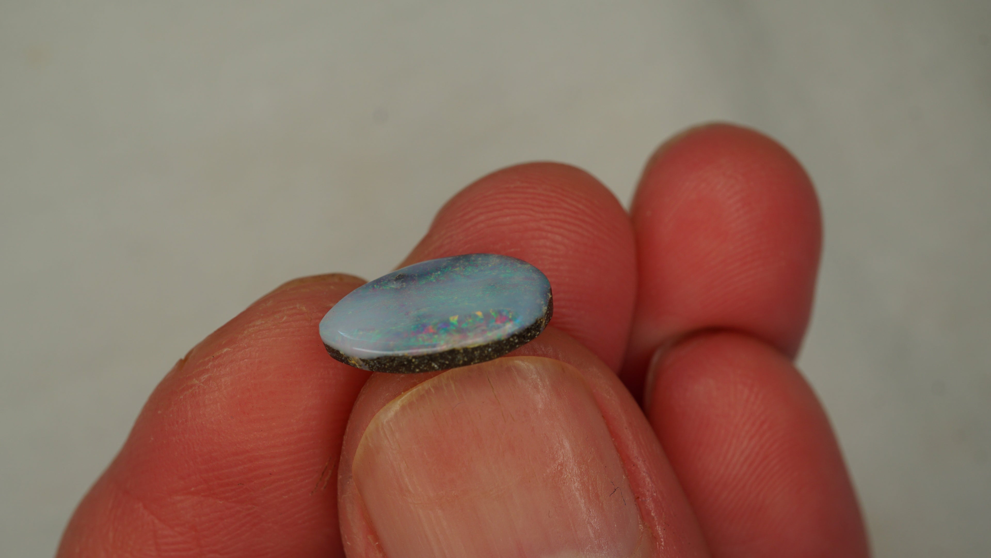 2.5ct Boulder Opal - Purplish White Body Tone with Purple & Green Play
