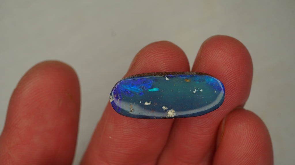 8.8ct Boulder Opal - Dark Blue Body Tone with Bright Green Play