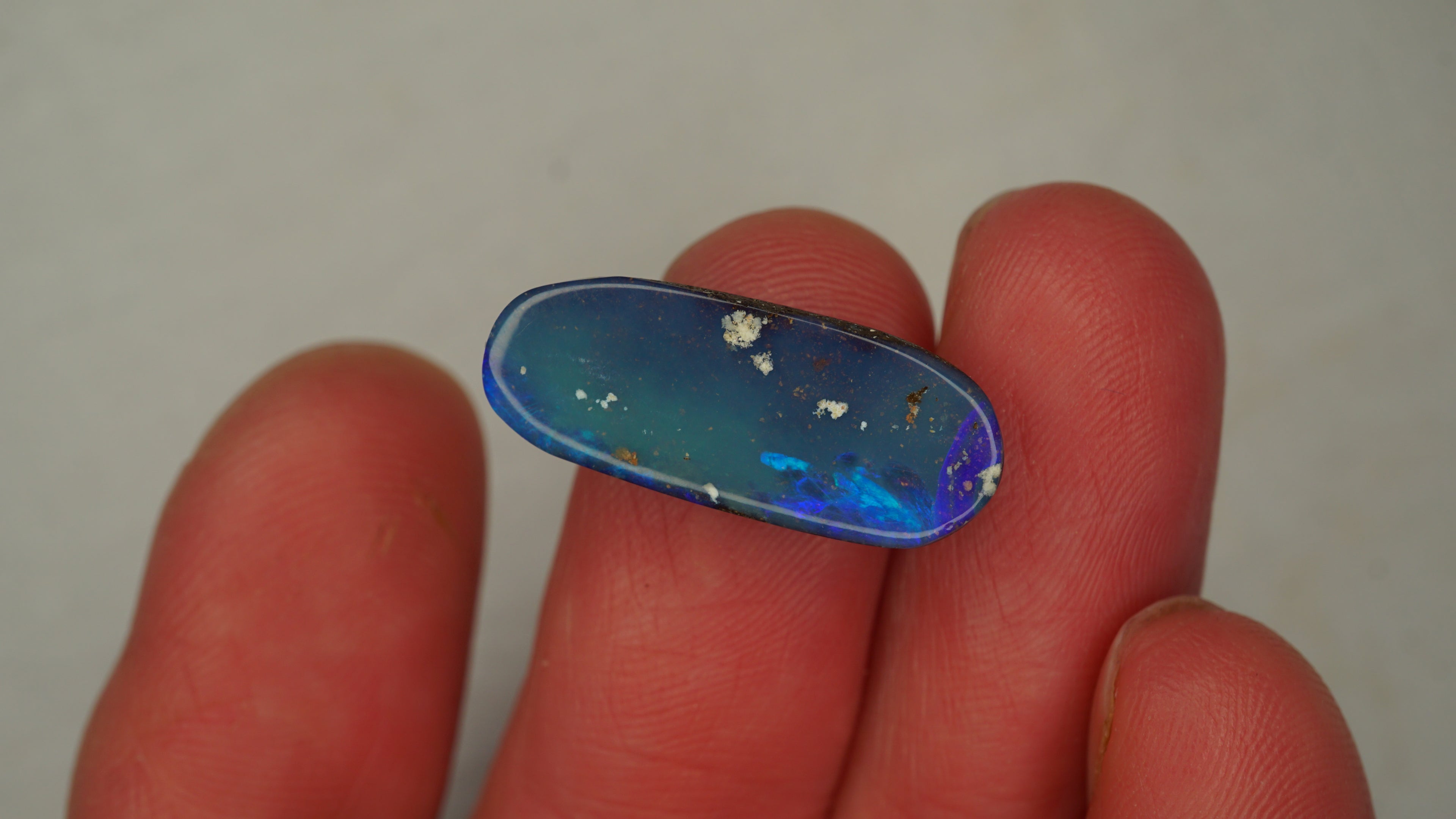 8.8ct Boulder Opal - Dark Blue Body Tone with Bright Green Play