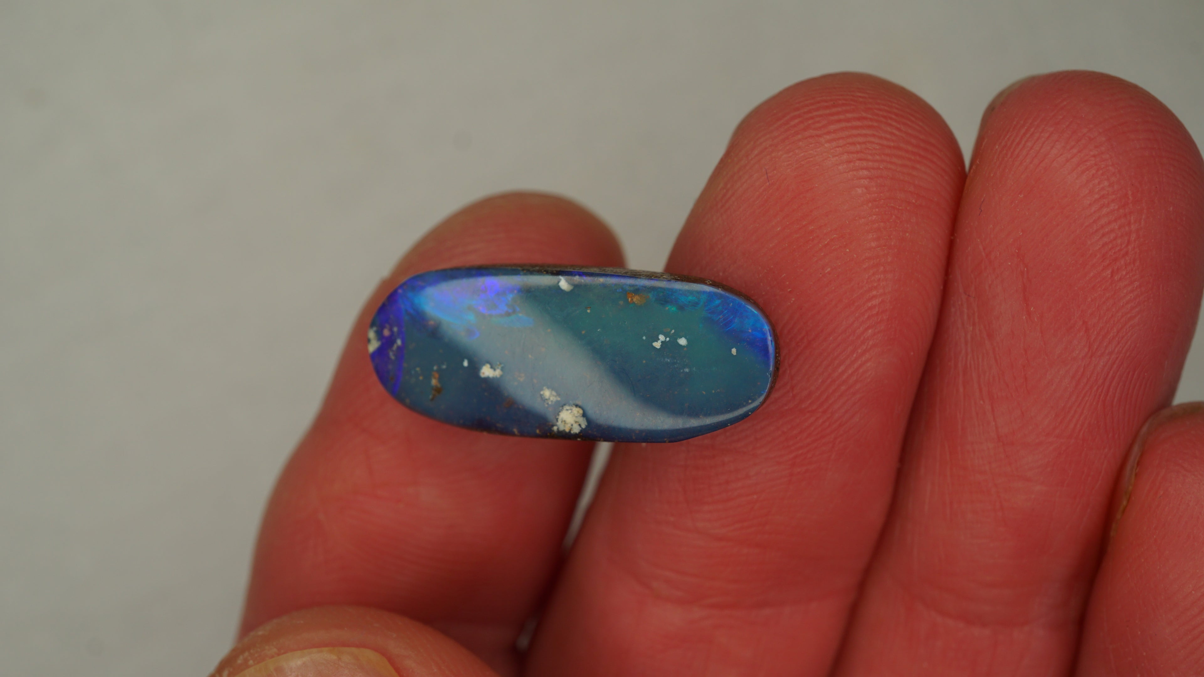 8.8ct Boulder Opal - Dark Blue Body Tone with Bright Green Play