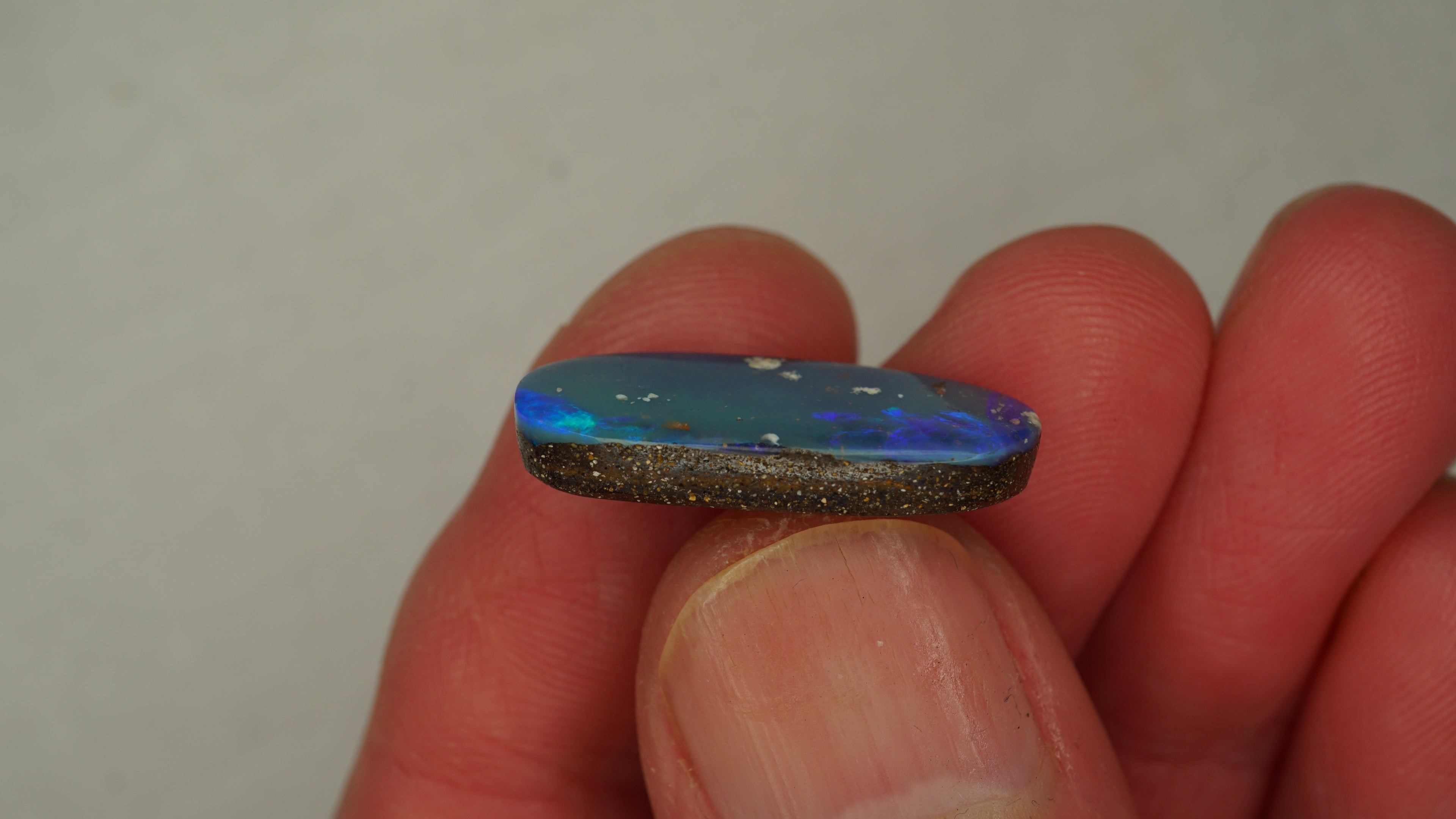 8.8ct Boulder Opal - Dark Blue Body Tone with Bright Green Play