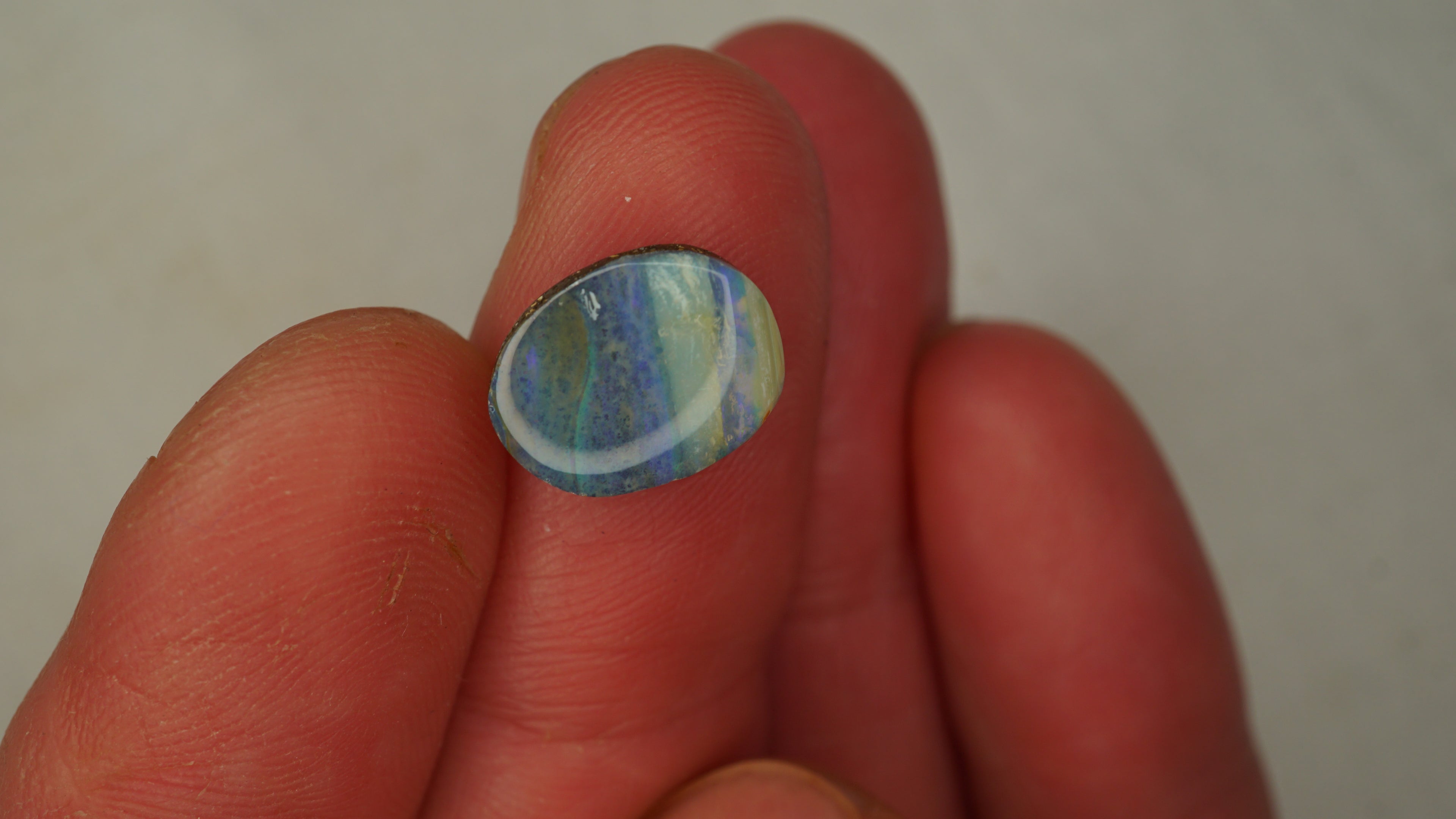 4.5ct Boulder Opal - Bluish Purple Body Tone with Green Play Bands