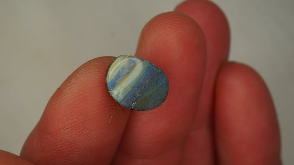 4.5ct Boulder Opal - Bluish Purple Body Tone with Green Play Bands