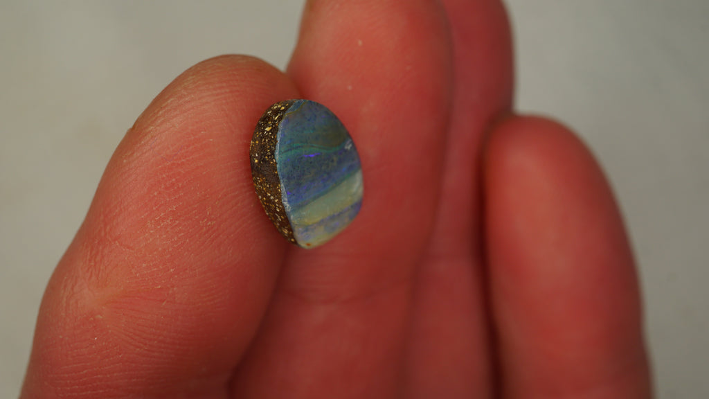 4.5ct Boulder Opal - Bluish Purple Body Tone with Green Play Bands