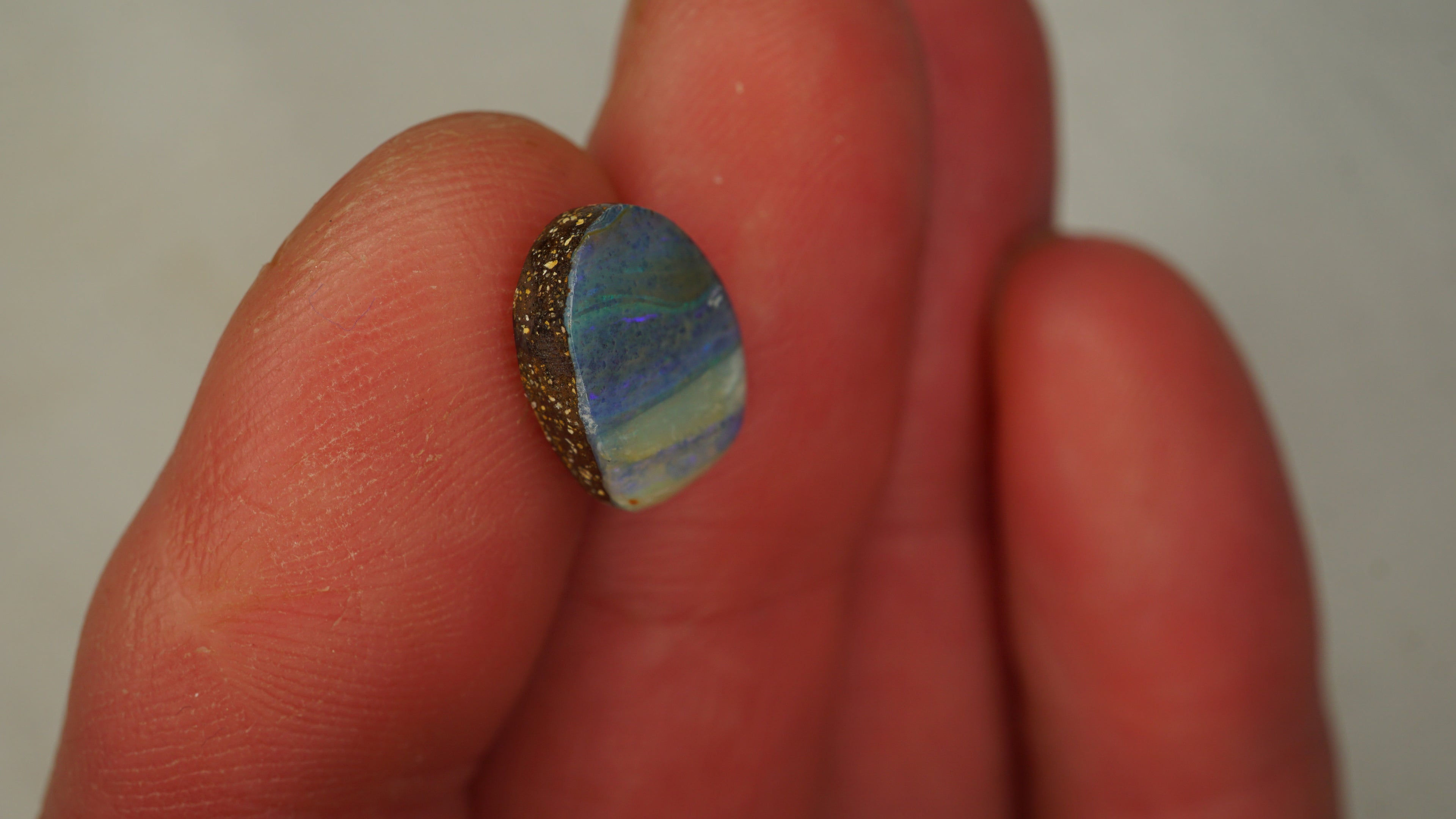 4.5ct Boulder Opal - Bluish Purple Body Tone with Green Play Bands