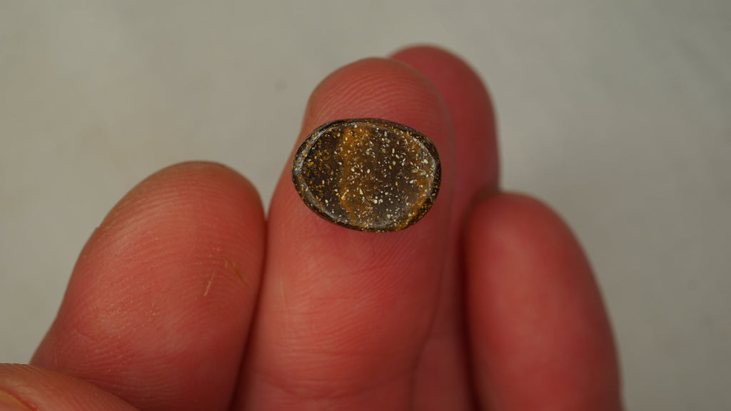 4.5ct Boulder Opal - Bluish Purple Body Tone with Green Play Bands