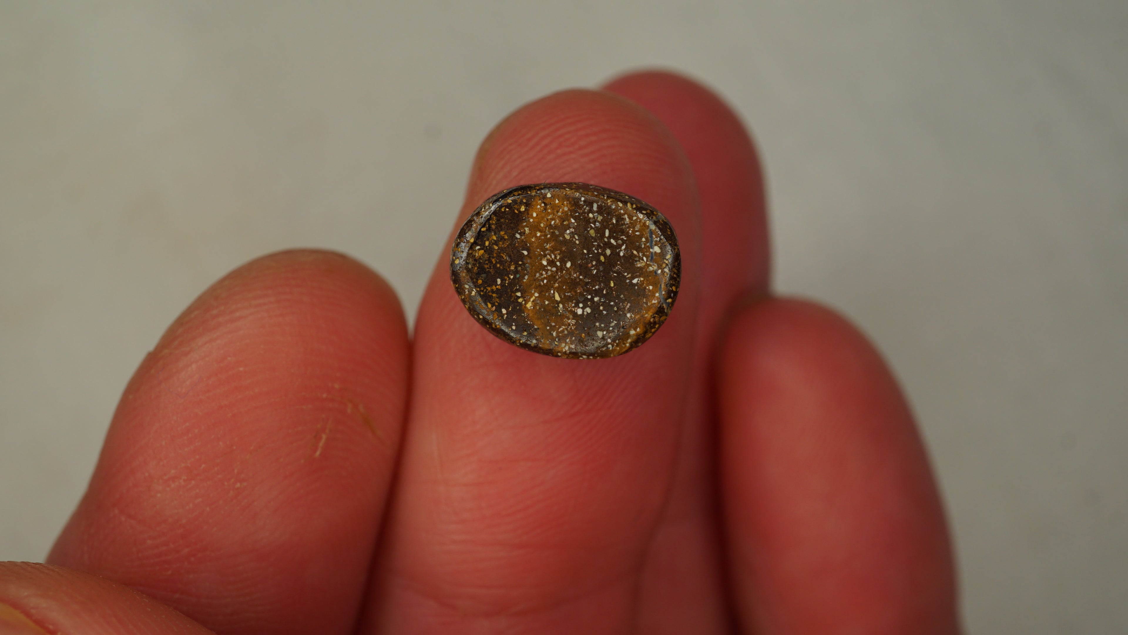 4.5ct Boulder Opal - Bluish Purple Body Tone with Green Play Bands