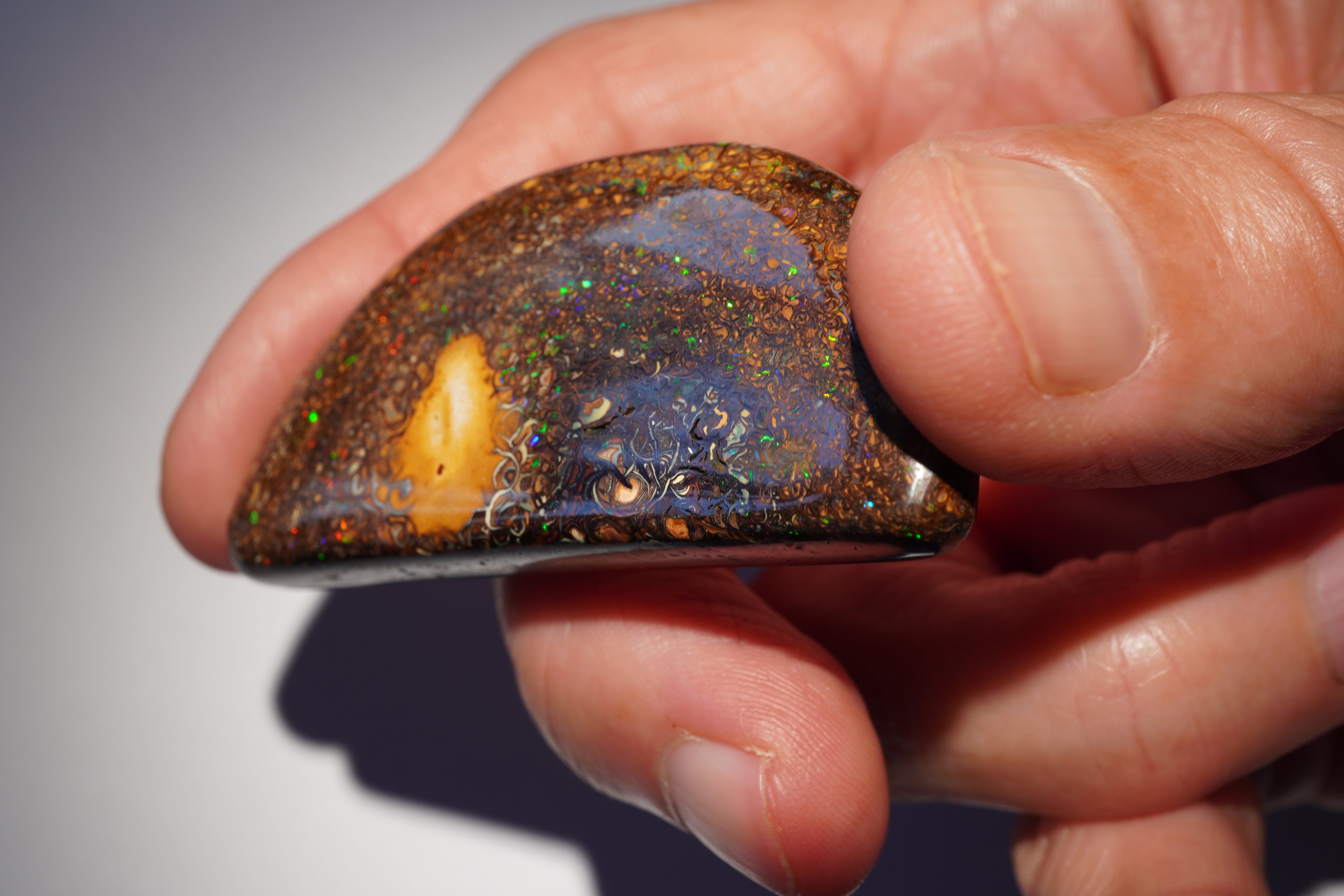 167.4ct Koroit Boulder Opal Specimen (Half Moon) — Nebula Drift