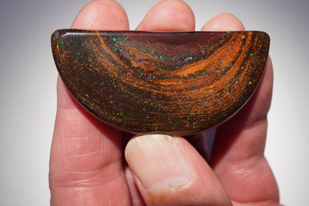 167.4ct Koroit Boulder Opal Specimen (Half Moon) — Nebula Drift