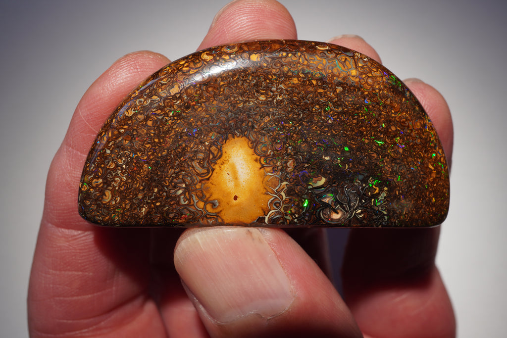 167.4ct Koroit Boulder Opal Specimen (Half Moon) — Nebula Drift