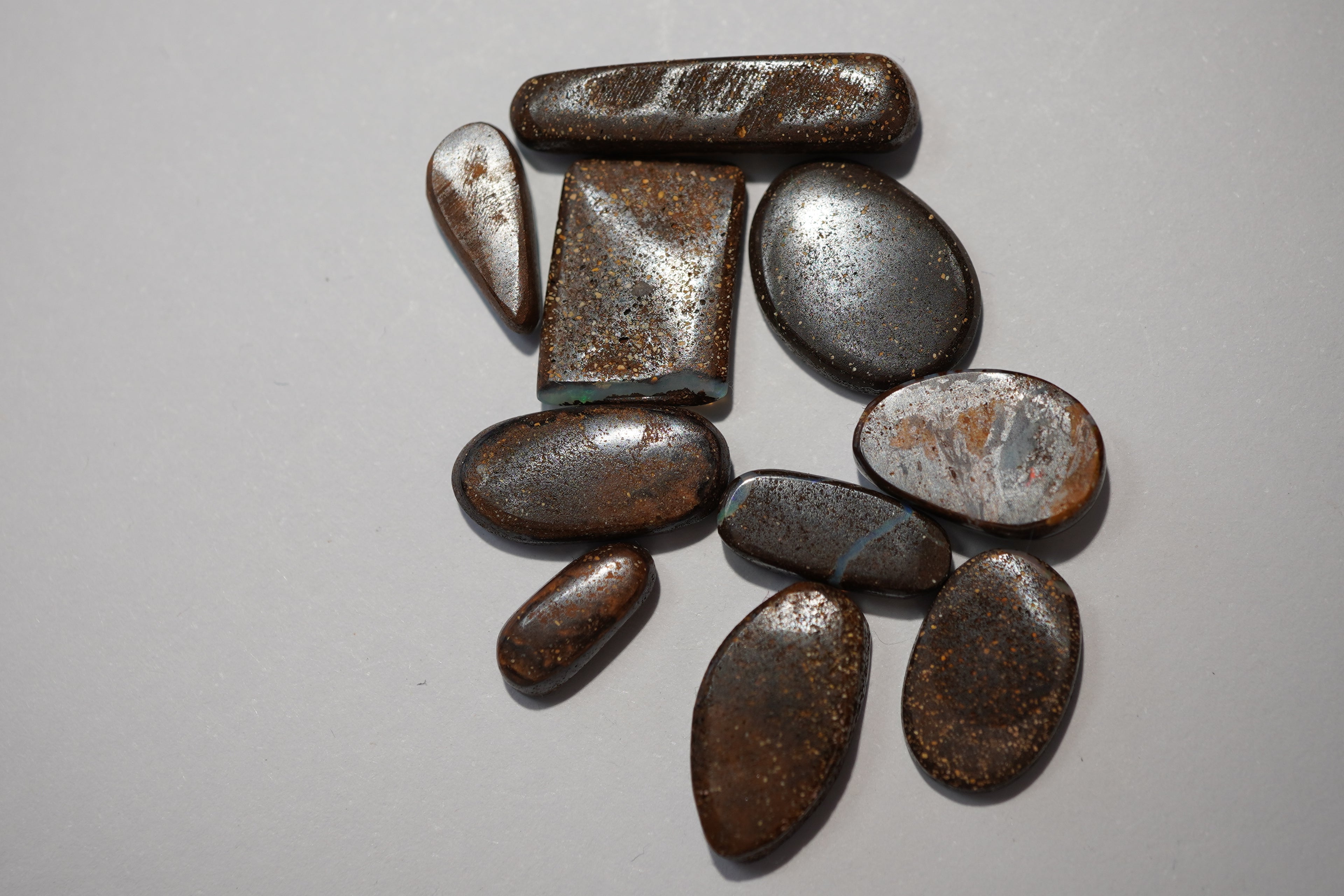 Bench Parcel - Green & Blue Selection - 10 Stone Boulder Opal Lot (22.9ct Total)
