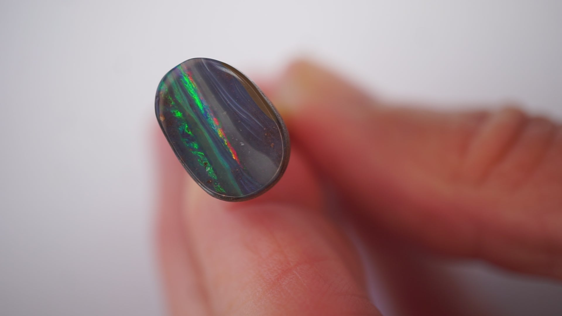 5.4ct Boulder Opal - Neon Green & Crimson Streaks on Blue Host Body Tone