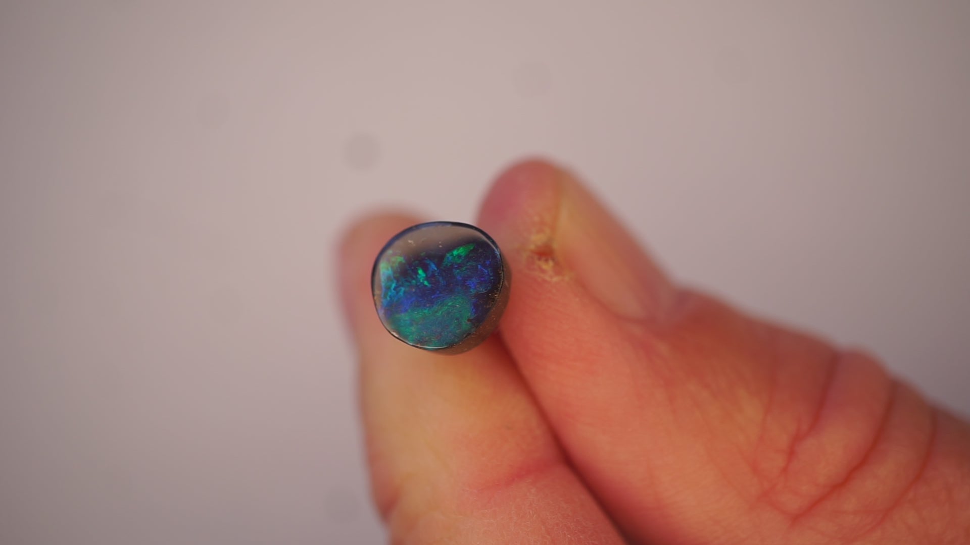 2.2ct Boulder Opal - Green Play on Deep Blue Host Body Tone