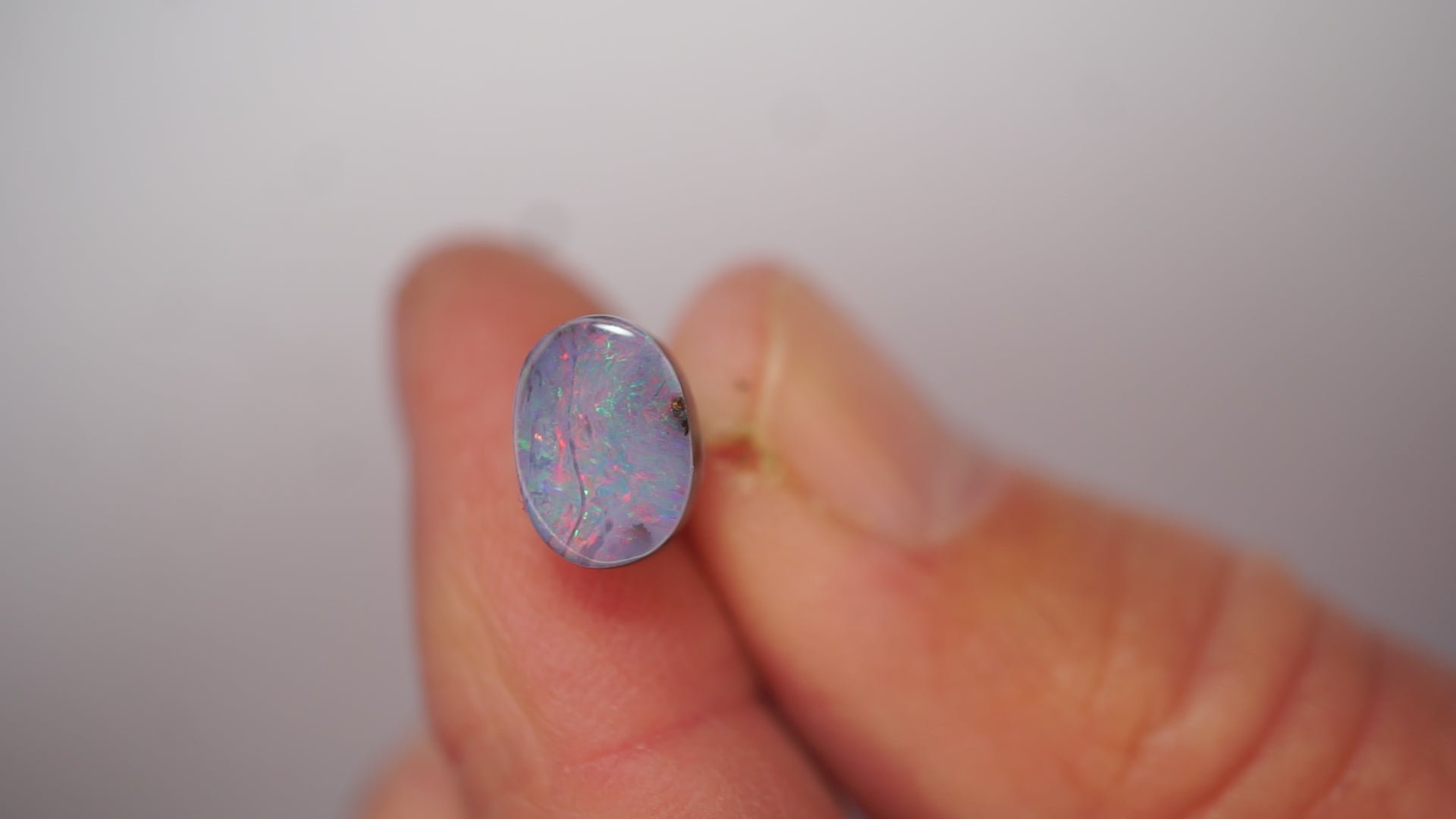 2.3ct Boulder Opal - Crimson Play on Pale Purple Host Body Tone
