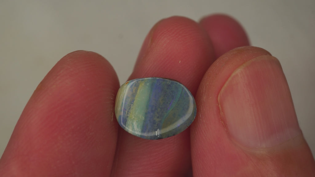 4.5ct Boulder Opal - Bluish Purple Body Tone with Green Play Bands