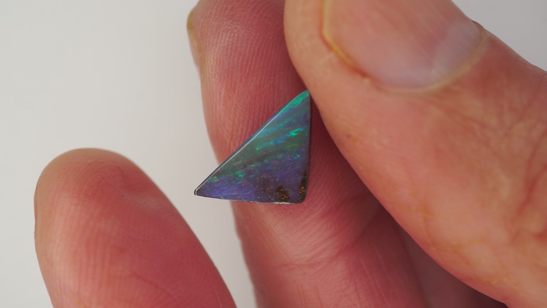 2.8 ct Triangular Blue Boulder Opal - Green Linear Colour Play